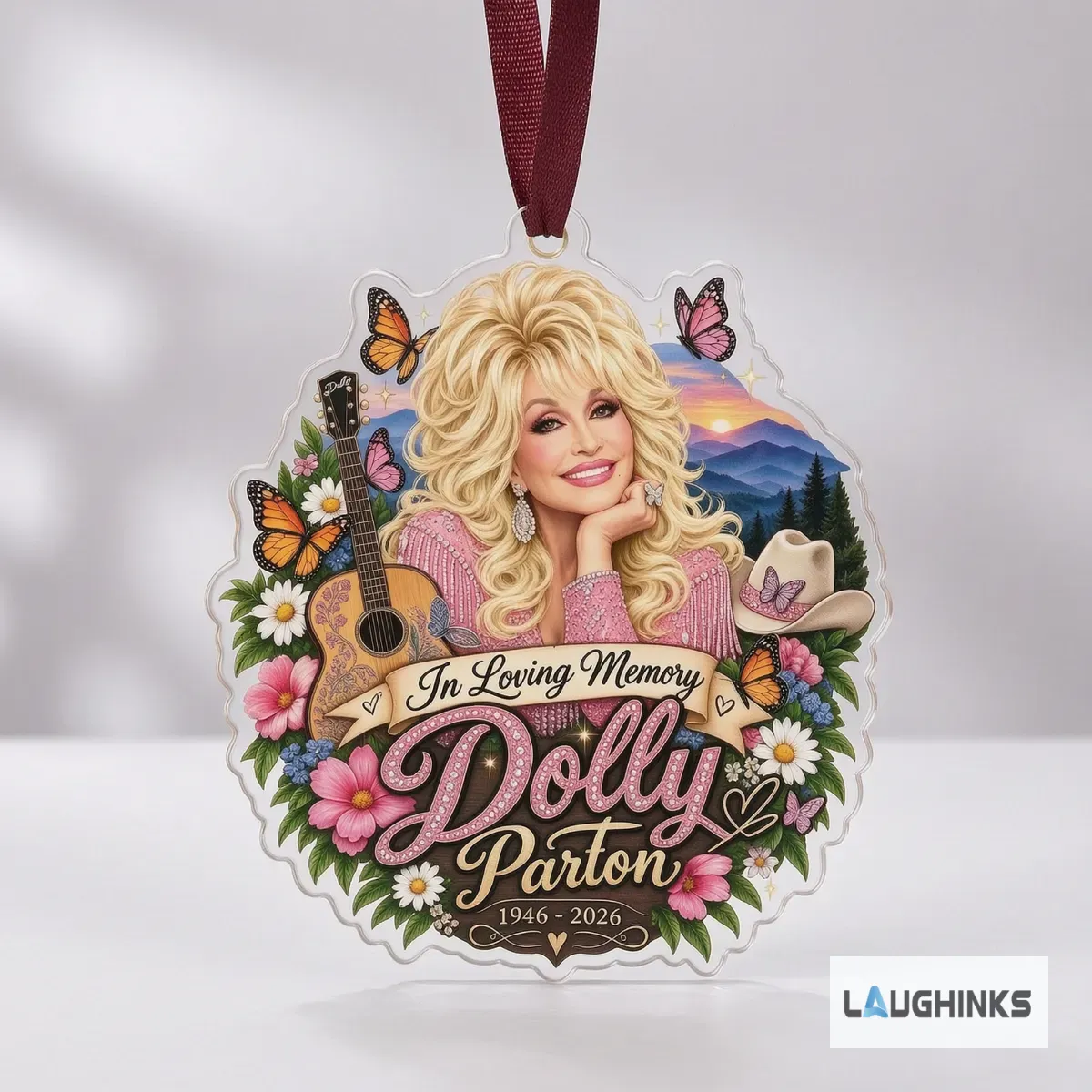 Dolly Parton In Loving Memory 1946 2026 Acrylic Christmas Ornament 5 Dolly Parton tribute ornament hanging on a festive green Christmas tree with golden baubles.
