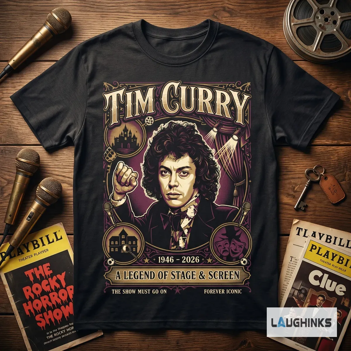 Tim Curry A Legend Of Stage And Screen Tribute Shirt 1946 2026 7 Person wearing Tim Curry 1946-2026 tribute shirt in a theater setting.