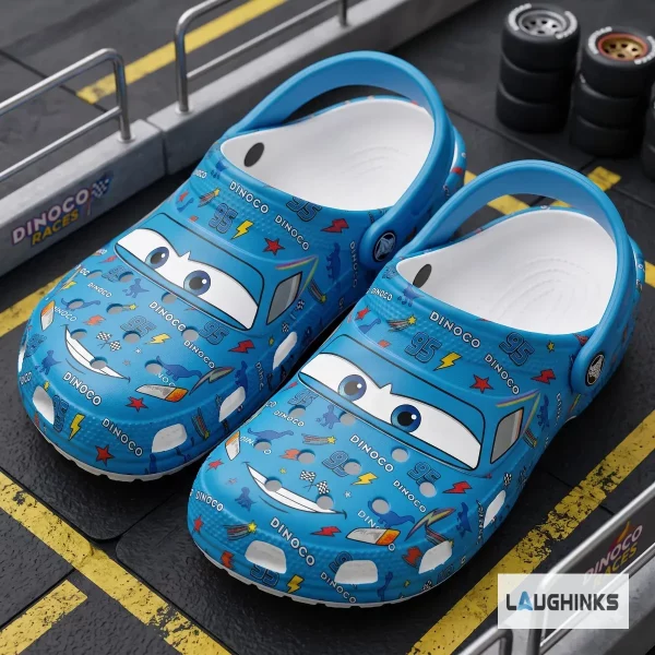 Top view of blue Disney Pixar Lightning McQueen Dinoco clogs with 95 branding and racing graphics.