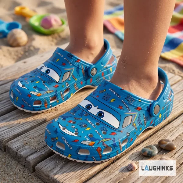 Top view of blue Disney Pixar Lightning McQueen Dinoco clogs with 95 branding and racing graphics. (Detail view #3)